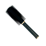 Streetwise Hair Fryer Brush Stun Gun with removable hairbrush head and rechargeable concealed stun device.