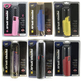detail view of assorted Streetwise 18 pepper spray keychains with key ring attachment packaged inside sealed oyster clam shells for safety