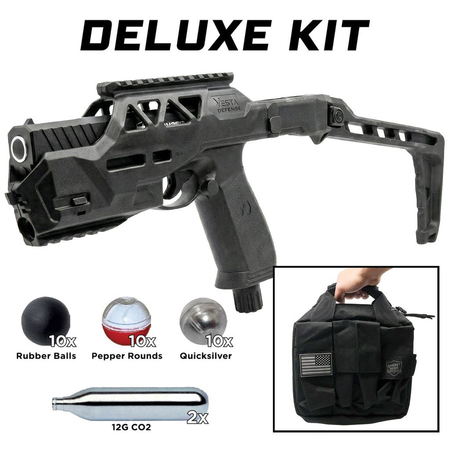 Streetwise HEAT Pepper Launcher Deluxe Kit with folding stock, tactical carrying case, pepper rounds, rubber balls, metal composite rounds, and CO2 cartridges.
