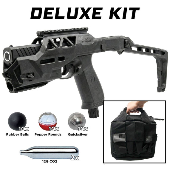 Streetwise HEAT Pepper Launcher Deluxe Kit with folding stock, tactical carrying case, pepper rounds, rubber balls, metal composite rounds, and CO2 cartridges.