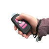 Pink Streetwise Razor stun gun shown held in a person’s hand, displaying its slim body, front electrodes, and built‑in flashlight.