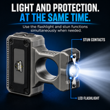 Streetwise Sting Ring Pro 36 million volt rated rechargeable stun gun showing ring grip, LED flashlight and electrical contact electrodes shown.