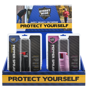 Ten‑pack Streetwise stream pepper spray shown in a countertop display box with each canister visible in its packaging mic colors of black and pink.