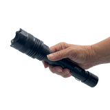 rechargeable tactical stun flashlight with a durable black metal body and integrated stun feature bwing held in hand