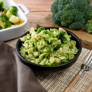 freeze‑dried broccoli presented in a serving dish, displayed as part of a long‑term survival‑food assortment