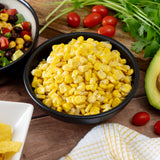 freeze‑dried corn presented in a serving dish, displayed as part of a long‑term survival‑food assortment