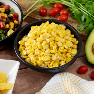 freeze‑dried corn presented in a serving dish, displayed as part of a long‑term survival‑food assortment
