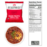 shelf‑stable organic pineapple chipotle chili pouch displayed as part of a survival‑food assortment for long‑term storage