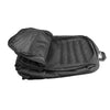 Tactical pack’s upper section opened to show protective padding and structured storage for firearm parts.