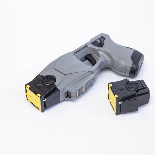 angled view of the TASER X1 showing trigger, safety switch, and polymer housing