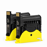 Two TASER X2 replacement cartridges with black housings, gold electrical contacts, and yellow lower sections on a white background.
