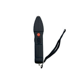 Close‑up of the Touchdown stun gun’s control switches, highlighting the power slider, stun button, and alarm control.