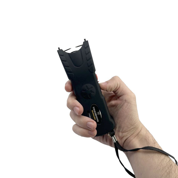 Streetwise Touchdown 89 Million Volt rechargeable stun gun with built-in alarm, LED flashlight, rubberized grip, disable pin, and nylon holster.