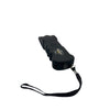 Black Touchdown stun gun with alarm shown with its removable safety pin attached to the wrist strap for disable‑feature protection.