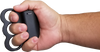 Triple Sting Ring stun gun shown held in a person’s hand, highlighting its circular grip and activation button placement.