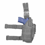 Drop‑leg holster in urban gray showing the main pouch, buckle clips, and thigh‑strap configuration.