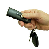 color black USB secure keychain stun gun shown in a person’s hand to display size, grip, and control placement