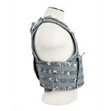 Digital‑camo Cumberland‑style plate carrier highlighting modular attachment points, rugged stitching, and contoured plate pockets.