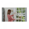 Window Bully device shown on a sliding door track, demonstrating how it prevents the door from opening.