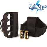 Complete kit layout featuring the knuckle‑style stun gun, charging cable, wrist strap, and all included accessories.