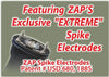 Close view of the ZAP Hike‑N‑Strike hiking staff showing the electrified stun electrodes positioned near the top of the shaft below the flashlight.